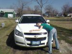 My new car... I loves it so I hugs it!