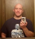 Proudly modeling for the new line of Mr Clean bobbleheads